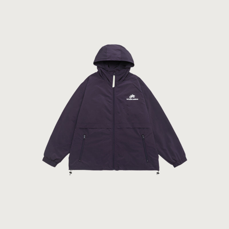 Navy windbreaker jacket with white bicycle logo, zip front closure and side pockets displayed against light gray background
