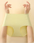 Close-up demonstration of light yellow brief's elastic fabric with hands stretching at sides to show flexibility