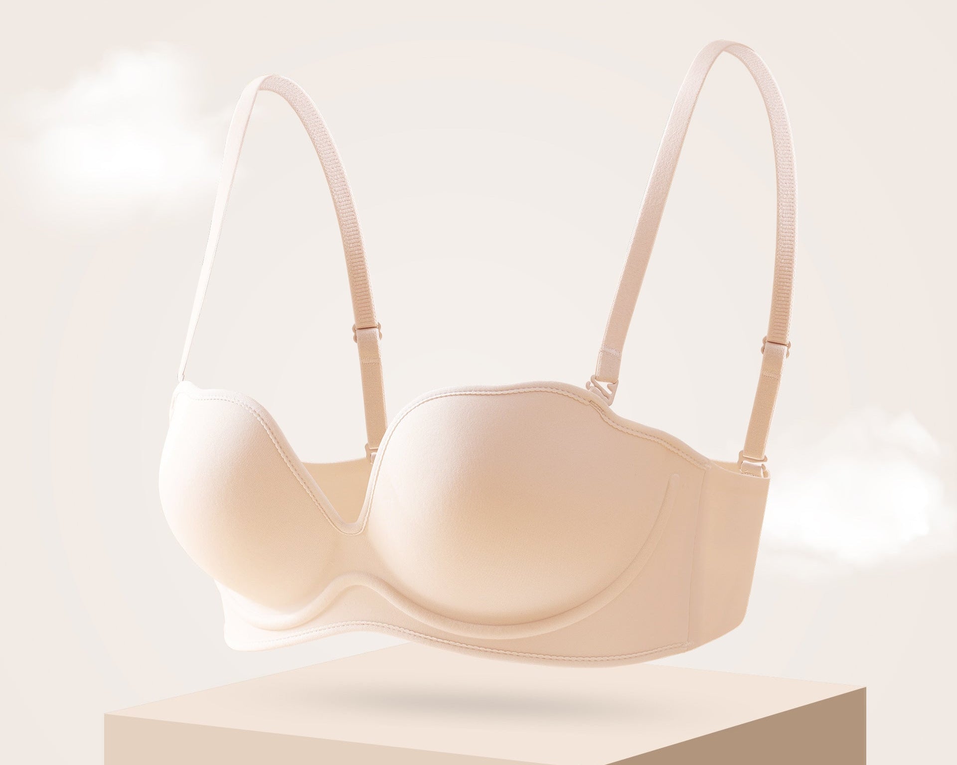 Medium nude seamless strapless push-up bra designed for lift and support with a smooth, breathable fabric.