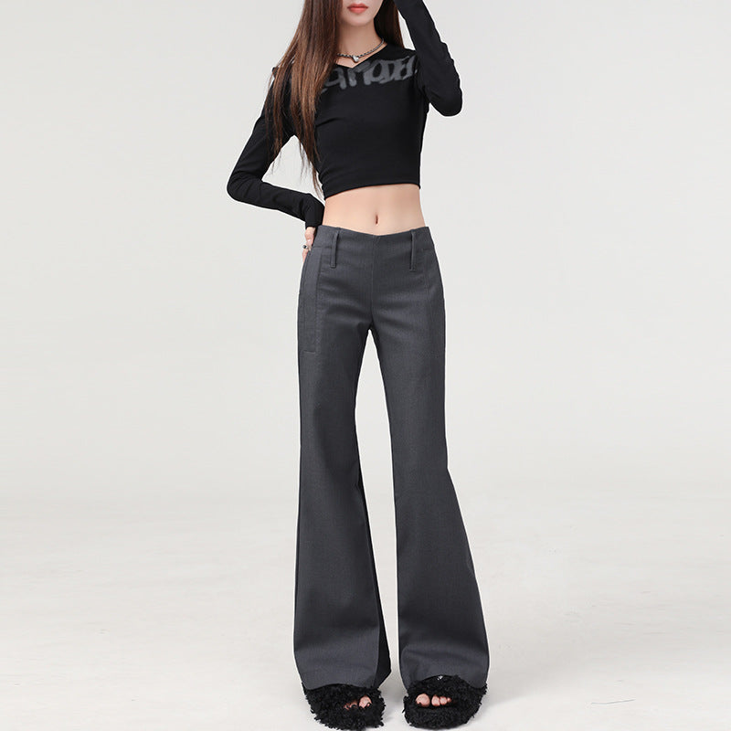 Angled front view, full-body shot of gray low-rise flared pants with modern silhouette.
