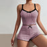 Mauve colored ribbed knit sleep set with black lace trim, featuring cropped top and high-waisted shorts