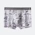 Another view of men's boxer briefs showing the full vintage game pattern with jumping figures and decorative elements