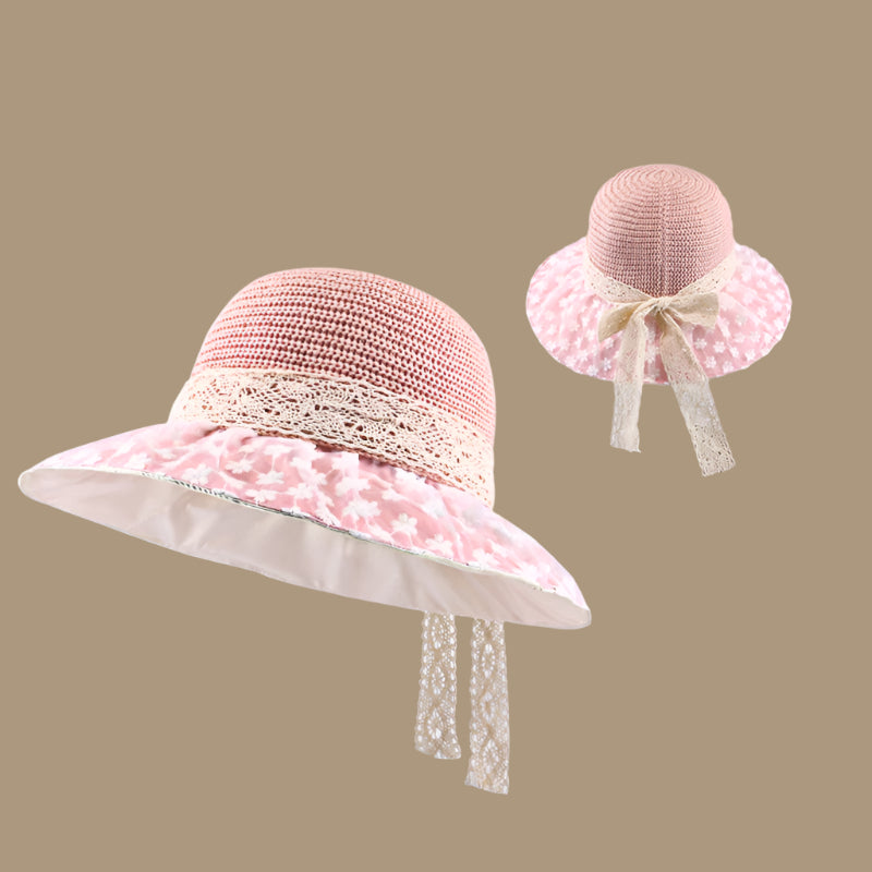 A pink woven sun hat with a lace-trimmed brim and a ribbon bow at the back, shown in two angles for detail emphasis.