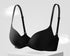  Wireless black push-up bra featuring a front closure and sleek, elastic logo straps for secure support.