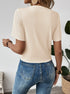 Back view of beige ribbed short sleeve blouse