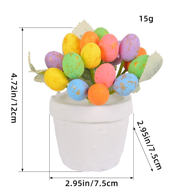 A close-up of a white ceramic pot filled with multicolored artificial eggs, with measurement annotations showing the height and width of the decorative item.
