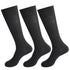 Three pairs of black dress socks with ribbed cuffs displayed against white background