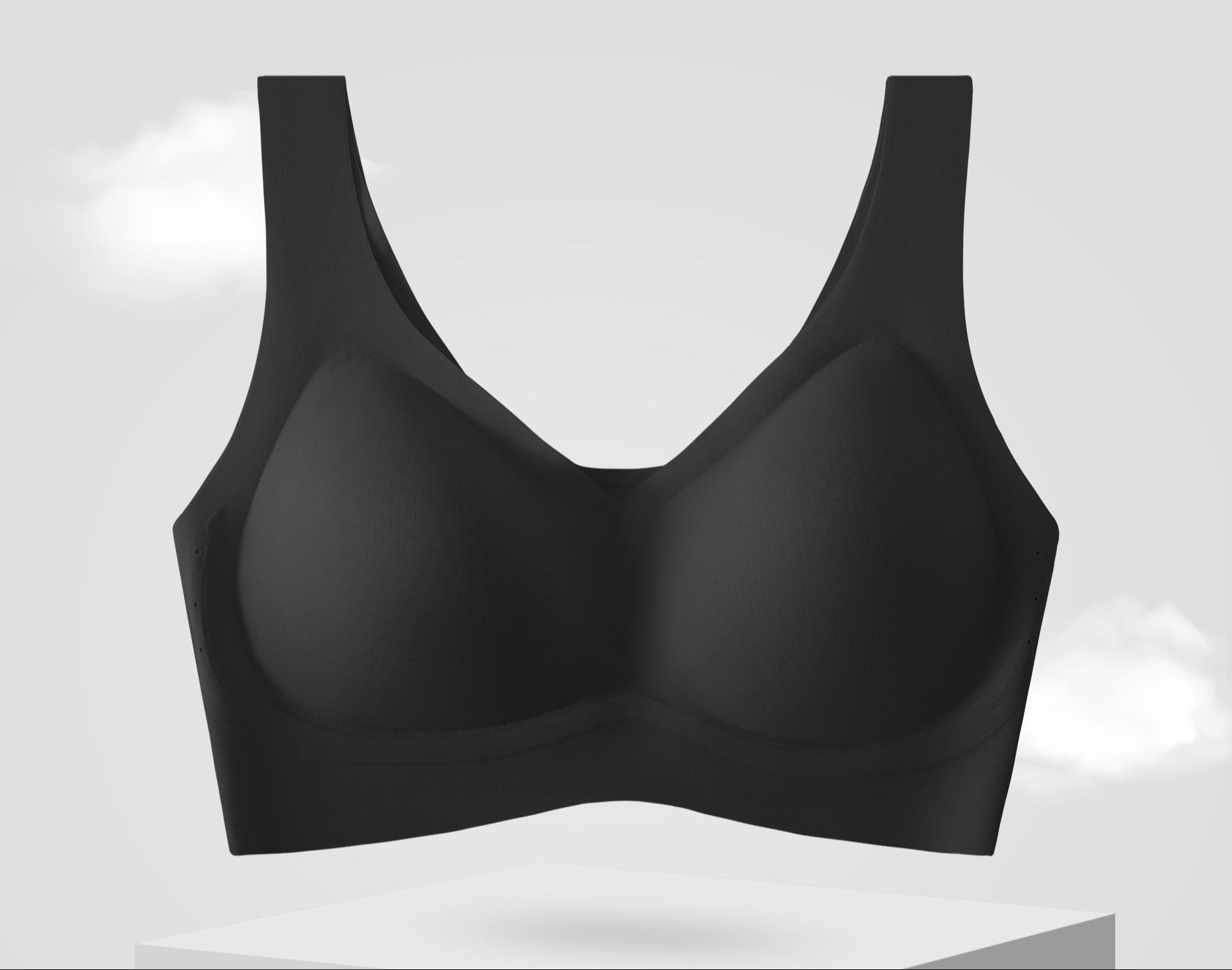 Black seamless cooling bra displayed on a pedestal.