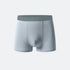 Light gray men's boxer briefs with gray waistband, featuring cooling fabric technology and seamless construction