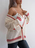 Close-up of black cardigan hood and drawstrings, showing detailed construction and texture