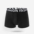 Black men's boxer briefs with contrasting "FASHION" branded elastic waistband, displayed against white background