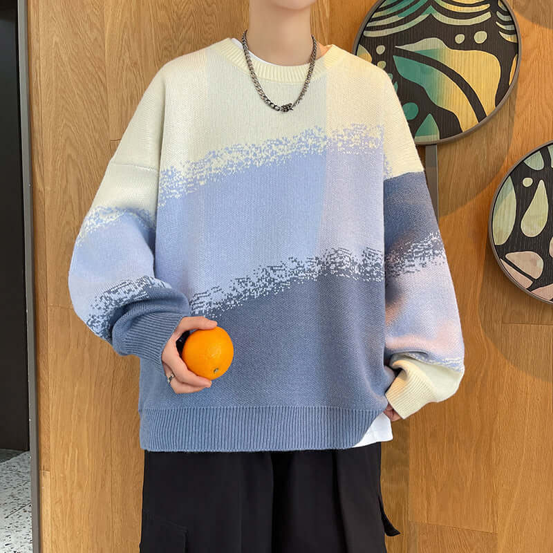 Cream-blue-navy sweater with pixelated color transitions