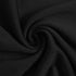 Close-up of soft black fabric, swirled to highlight its smooth texture.