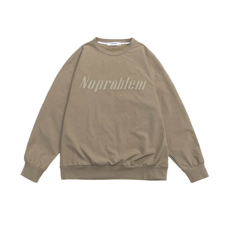 Beige oversized sweatshirt with ribbed cuffs and embossed "Noproblem" text, blending comfort with minimalist style