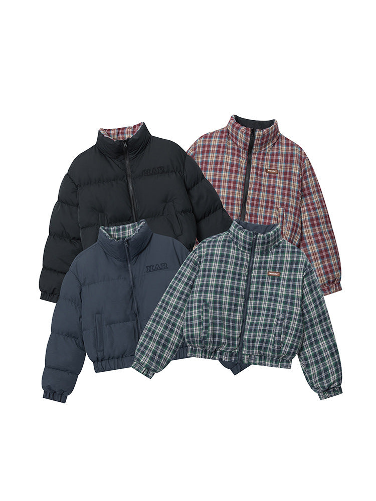 Four puffer jackets displayed flat: black with red plaid lining, navy with green plaid lining, and two fully plaid designs
