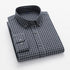 Charcoal gray windowpane check shirt with green buttons and button-down collar design