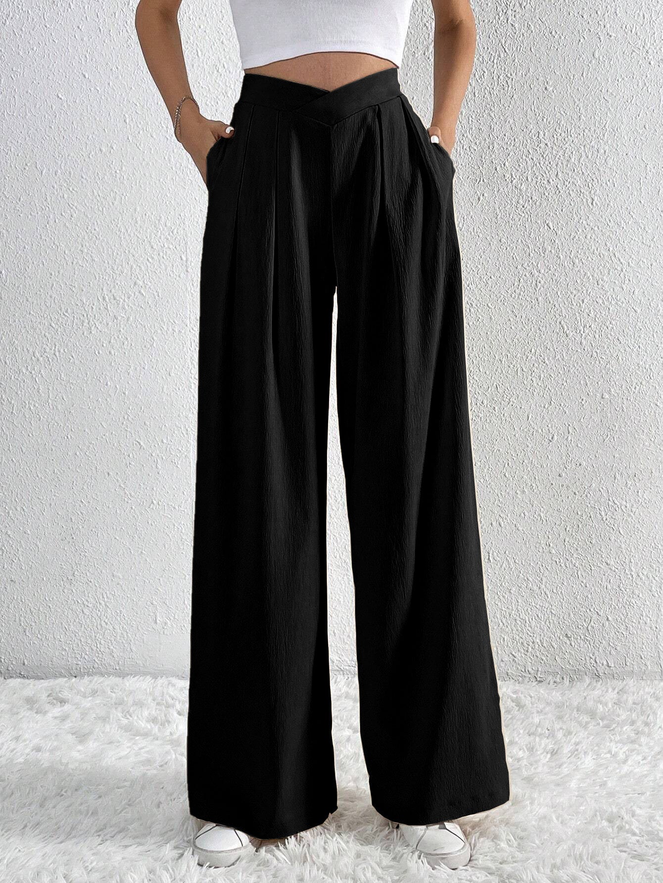 Black wide-leg trousers with V-shaped high waist and pleated front.