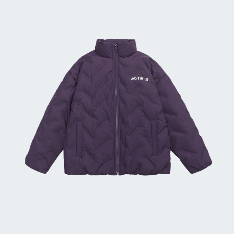 Purple Aesthetic quilted puffer jacket with zip front closure and white embroidered logo displayed flat against white background