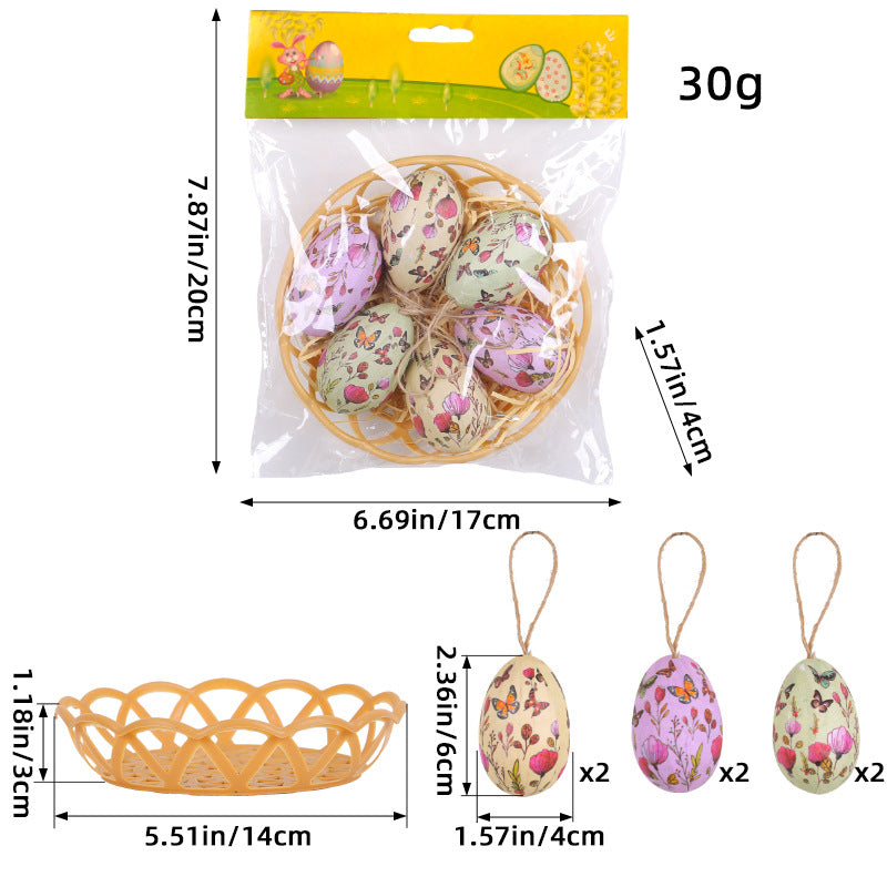  Packaged Easter egg ornament set with delicate floral and butterfly prints, including six hanging eggs and a woven basket.