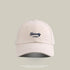White baseball cap with navy 'Naivety 1768' embroidered logo