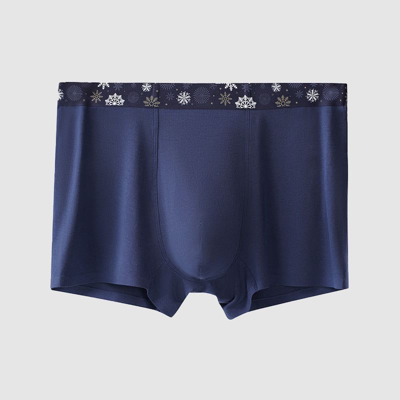Royal Blue men's boxer briefs with snowflake pattern waistband, seamless design for winter collection