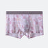 Men's underwear with delicate pink coral pattern on white background and gray waistband, showcasing botanical design