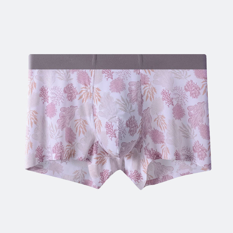 Men's underwear with delicate pink coral pattern on white background and gray waistband, showcasing botanical design
