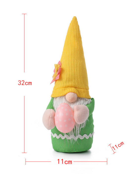 Measurement chart of a green Easter gnome plush with a yellow hat, displaying dimensions of 32cm height and 11cm width.