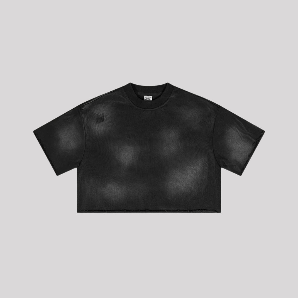 Black cropped t-shirt with subtle wash effect displayed flat against light gray background