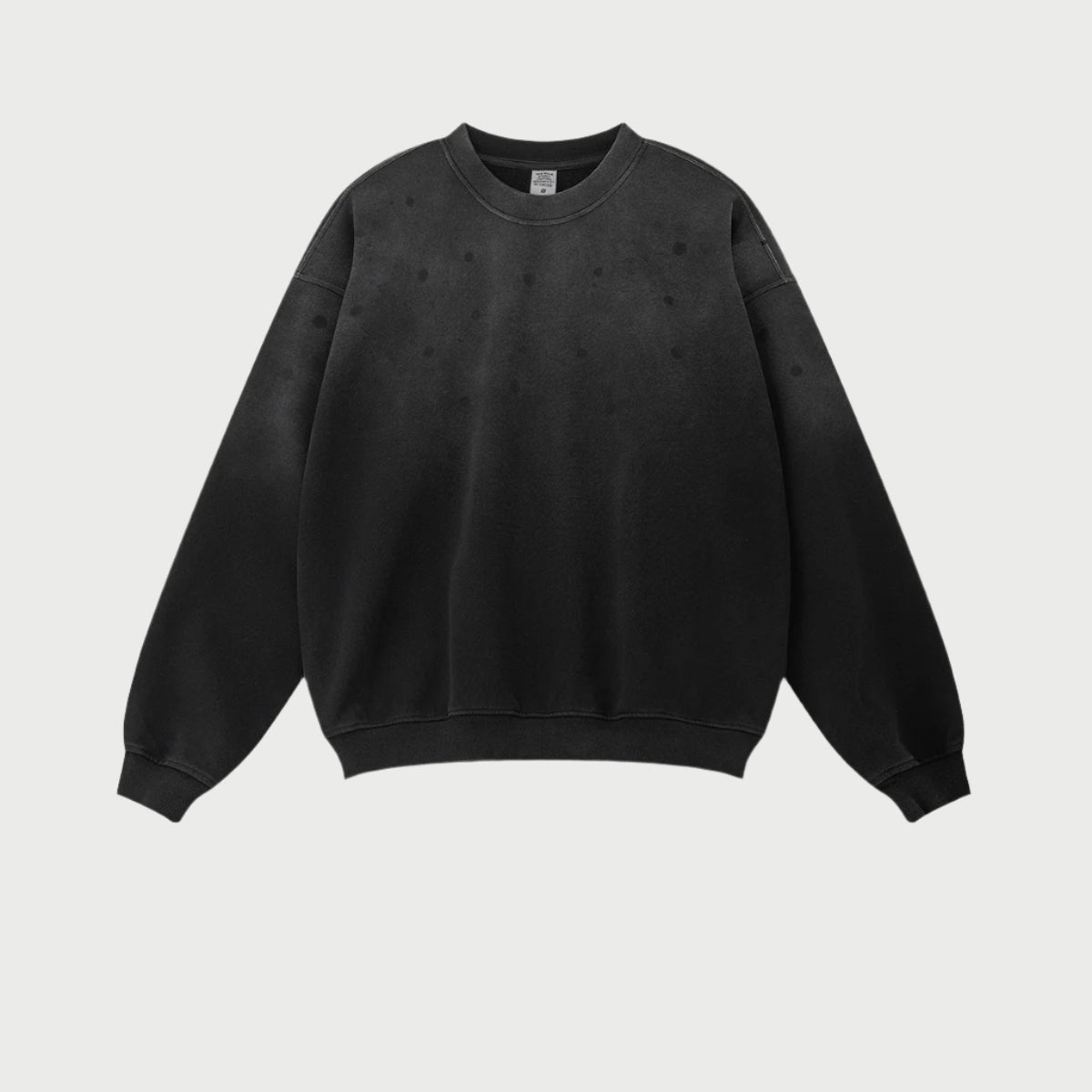 Black sweatshirt with faded splatter effect, shown flat lay