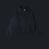 Black oversized hoodie with front kangaroo pocket and ribbed cuffs on dark background