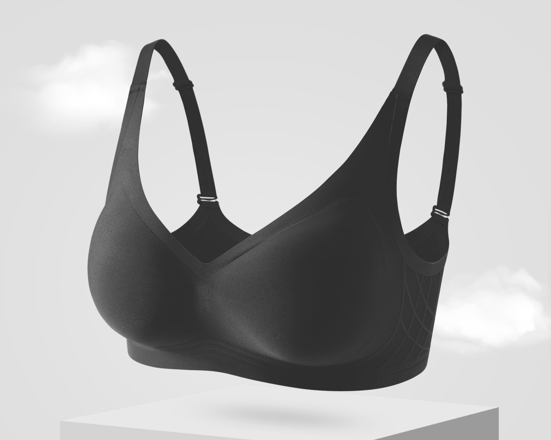 Seamless black push-up bra with breathable support and adjustable straps for a flattering fit.