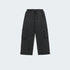 Flat lay product shot of black cargo pants with utility pockets and adjustable ankle cords