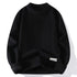 Black textured knit sweater