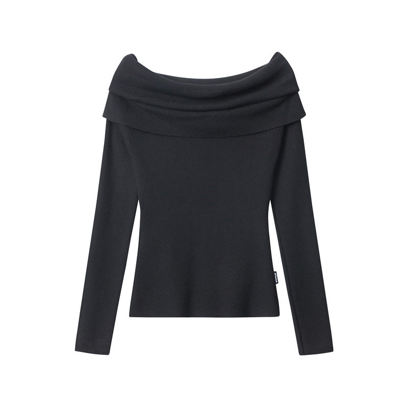 Black, off-shoulder long-sleeve sweater with a wide neckline, isolated on a white background.