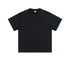 Product shot of black oversized t-shirt with crew neck and short sleeves on plain background