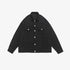 Oversized black denim jacket with silver buttons and traditional chest pocket design displayed against white background