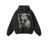 A black oversized hoodie with artistic graffiti-style graphic featuring skull imagery and lyrical text, displayed flat against white background