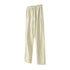 Cream colored sweatpants with elastic waistband and white drawstring, featuring side pockets and straight leg design