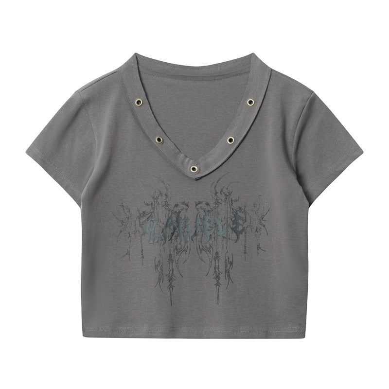 Gray version of the crop top featuring metal grommet neckline and mirror-image abstract print