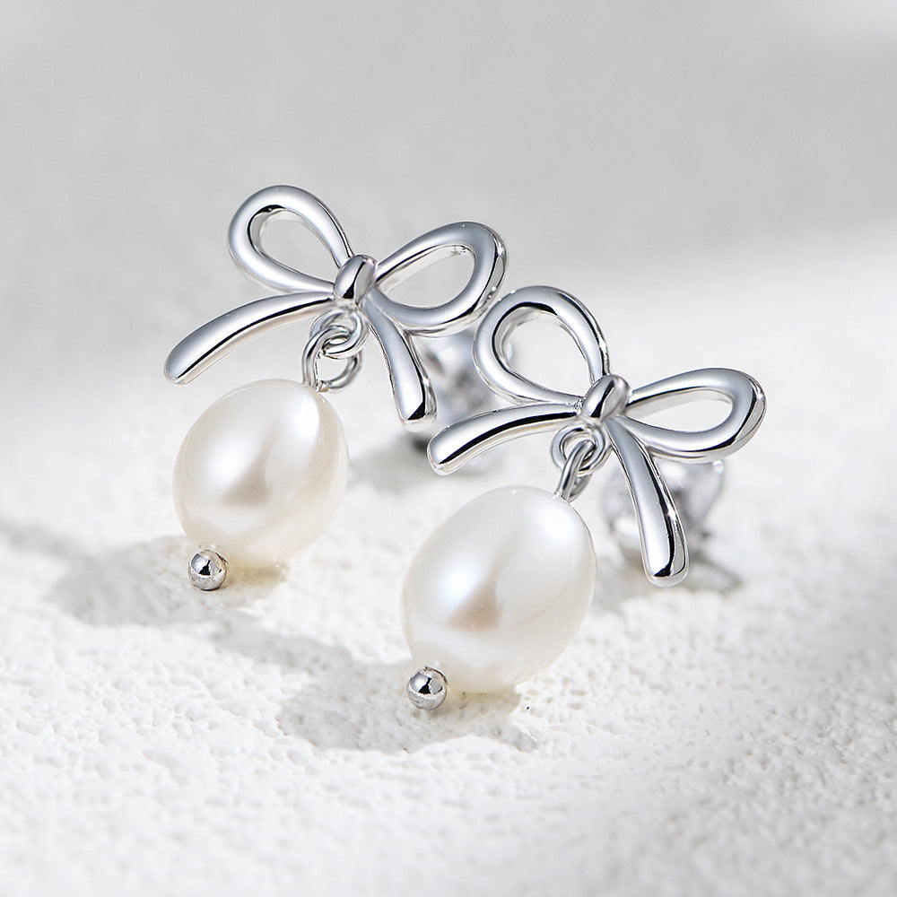Silver bow pearl earrings 925 silver ribbon with pearl drop