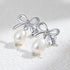 Silver bow pearl earrings 925 silver ribbon with pearl drop