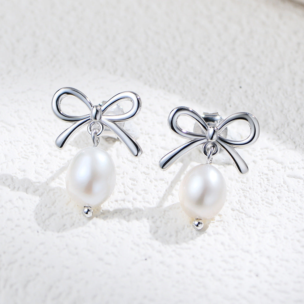 925 silver bow pearl drop earrings ribbon stud design