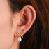 Gold bow pearl drop earrings 925 silver side view on ear