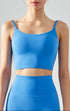 Blue seamless tank top cropped with cami straps and sculpting fit
