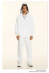 Model wearing white hoodie and sweatpants with white sunglasses and silver chain necklace