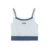 A white ribbed crop tank with navy blue contrast trim and small metal logo plate, displayed flat against white background