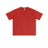 Rust red oversized t-shirt with clean crewneck, short sleeves and relaxed fit, featuring soft cotton fabric with minimal design elements