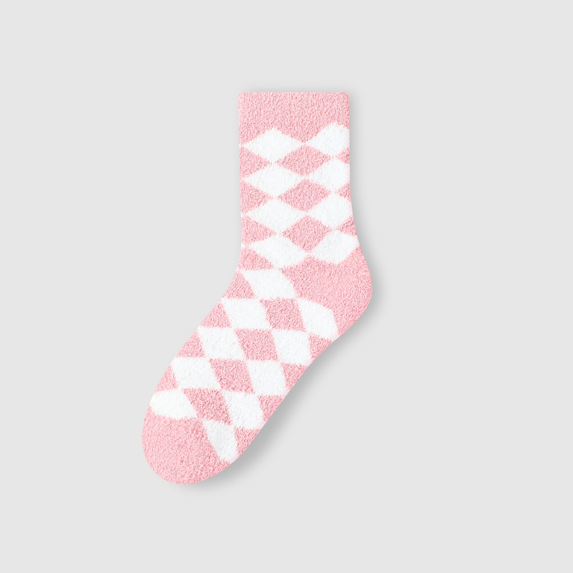 Single pink and white argyle patterned fuzzy sock against white background