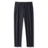 Navy blue pleated dress pants with straight leg cut and front button closure on white background